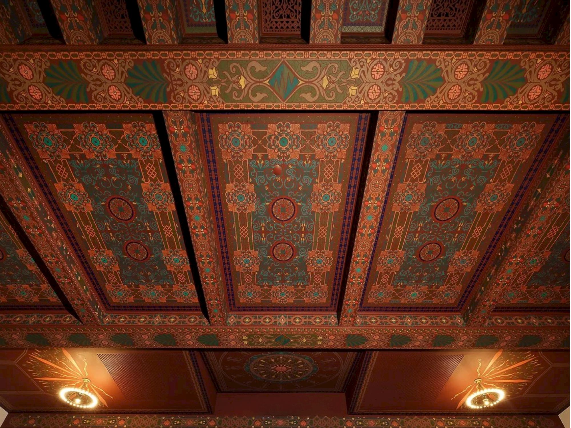 The image shows an ornately decorated ceiling with intricate patterns and warm lighting creating a rich, detailed design.