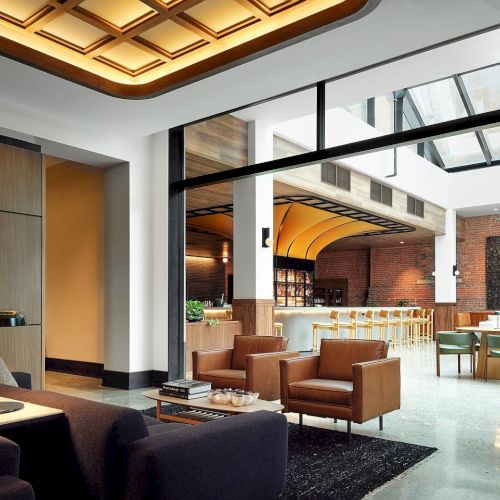 The AC Detroit Conservatory offers an expansive event space, complete with high glass ceilings, a full bar, and multiple seating areas.